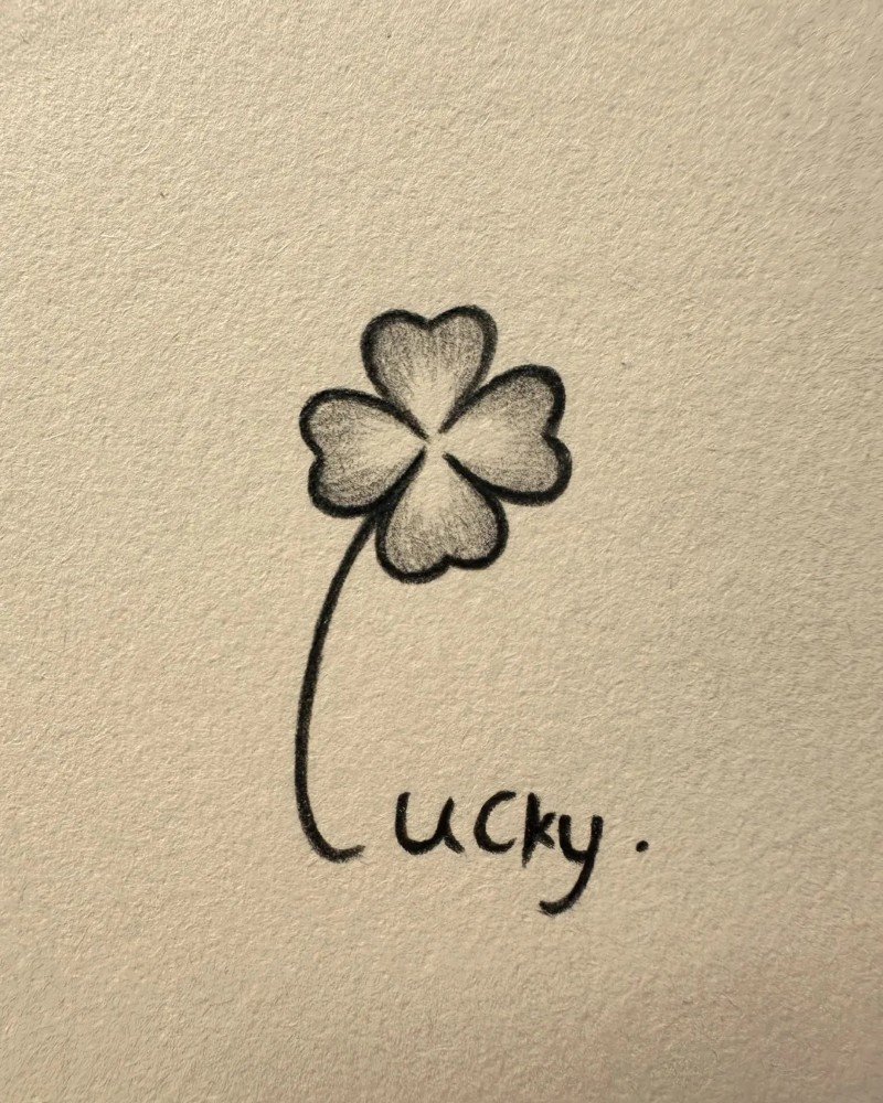 How to draw a four leaf clover step by step