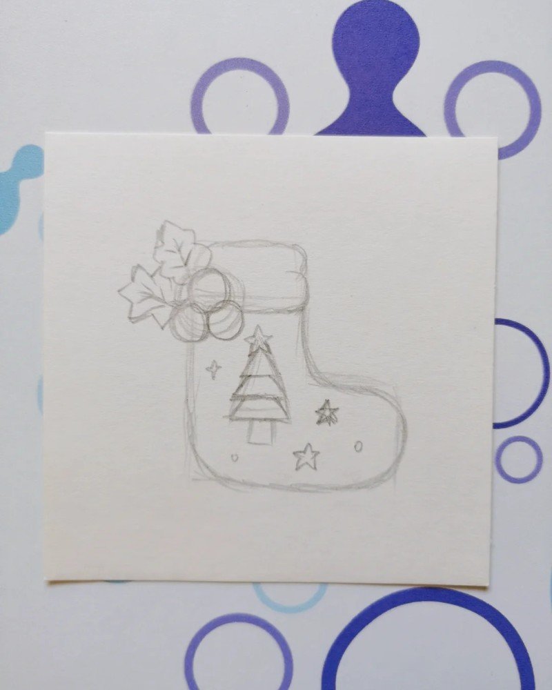 Step 5: Finalize the drawing by adding outlines, inner patterns, and more tiny elements like bows and snowflakes to complete the adorable Christmas stocking. 1